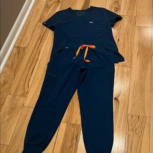 Figs Dark Blue Scrub Top with Orange Detail